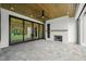 Covered patio features a fireplace and built-in grill at 1804 Stream Manor Ct, Wake Forest, NC 27587