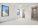 Bright bedroom with carpet flooring, en-suite bathroom, and walk-in closet at 1804 Stream Manor Ct, Wake Forest, NC 27587