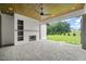 Covered patio with fireplace and view of the backyard at 1804 Stream Manor Ct, Wake Forest, NC 27587