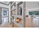 Stylish gray room divider with decorative shelving and gold accents at 1312 Hunting Ridge Rd, Raleigh, NC 27615