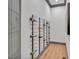Modern wine cellar with wall-mounted wine racks for extensive collection at 1312 Hunting Ridge Rd, Raleigh, NC 27615