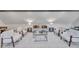 Bright game room featuring a plush sofa and armchairs, perfect for relaxation at 1312 Hunting Ridge Rd, Raleigh, NC 27615