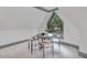 Charming game room with a window seat and a small table at 1312 Hunting Ridge Rd, Raleigh, NC 27615