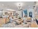 Spacious living room with large windows and open floor plan at 1312 Hunting Ridge Rd, Raleigh, NC 27615