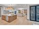 Open concept kitchen with island and stainless steel appliances at 1312 Hunting Ridge Rd, Raleigh, NC 27615