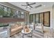 Screened porch with wicker furniture, creating a relaxing outdoor space at 1312 Hunting Ridge Rd, Raleigh, NC 27615