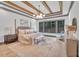 Spacious primary bedroom with sitting area and large windows at 1312 Hunting Ridge Rd, Raleigh, NC 27615