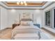 Bright bedroom with a queen-size bed and ensuite bath at 1312 Hunting Ridge Rd, Raleigh, NC 27615