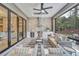 Outdoor kitchen with built-in grill and seating area at 1312 Hunting Ridge Rd, Raleigh, NC 27615