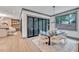 Elegant dining area with a table, chairs, and large windows at 1312 Hunting Ridge Rd, Raleigh, NC 27615