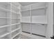 Large walk-in closet with ample shelving and hanging space at 1312 Hunting Ridge Rd, Raleigh, NC 27615