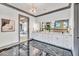 Modern bathroom boasting a double vanity and dark marble floors at 1312 Hunting Ridge Rd, Raleigh, NC 27615