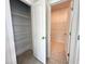 Walk-in closet with wire shelving and extra storage at 73 Sage Ln # 008, Four Oaks, NC 27524