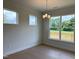 Bright dining room with hardwood floors and access to a deck at 73 Sage Ln # 008, Four Oaks, NC 27524