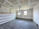Attached garage with concrete floor and automatic garage door at 73 Sage Ln # 008, Four Oaks, NC 27524