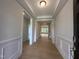 Bright and spacious foyer with hardwood floors and elegant trim at 73 Sage Ln # 008, Four Oaks, NC 27524