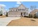 Image 1 of 44: 209 Oakenshaw Dr, Holly Springs