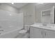 Bathroom with tub, toilet and single vanity at 305 Sutherland Dr, Franklinton, NC 27525