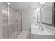 Double vanity bathroom with a large walk-in shower at 305 Sutherland Dr, Franklinton, NC 27525