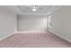 Large bedroom with carpeted floors and ceiling fan at 305 Sutherland Dr, Franklinton, NC 27525