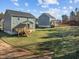 Two two-story houses with decks and stairs, in a grassy yard at 305 Sutherland Dr, Franklinton, NC 27525