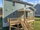 House exterior showcasing a deck and backyard at 305 Sutherland Dr, Franklinton, NC 27525
