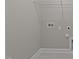Laundry room with shelving and hookups at 305 Sutherland Dr, Franklinton, NC 27525