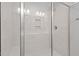 Walk-in shower with modern tile and glass enclosure at 305 Sutherland Dr, Franklinton, NC 27525