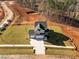 Aerial view of a house on a large lot with a two-car garage at 345 Sutherland Dr, Franklinton, NC 27525