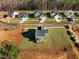 Aerial view of a house and surrounding neighborhood with new construction visible at 345 Sutherland Dr, Franklinton, NC 27525