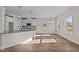 Bright dining area with hardwood floors and large windows at 345 Sutherland Dr, Franklinton, NC 27525
