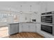 Modern kitchen with stainless steel appliances and an island at 345 Sutherland Dr, Franklinton, NC 27525