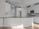 Spacious kitchen with white cabinets, granite countertops, and island at 345 Sutherland Dr, Franklinton, NC 27525