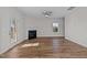 Living room with fireplace and hardwood floors at 345 Sutherland Dr, Franklinton, NC 27525