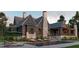 Luxury home with pool, patio furniture, and covered porch at 102 Peddler Mill Way, Pittsboro, NC 27312