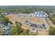 Aerial view of new homes and community, featuring open green spaces and modern designs at 2635 Marchmont St, Raleigh, NC 27608