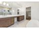 Bathroom boasts double vanity, marble flooring, and a large walk-in shower at 43 Laurel Knoll Dr, Pittsboro, NC 27312