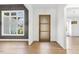 Hardwood floors and neutral colors in this entryway at 43 Laurel Knoll Dr, Pittsboro, NC 27312