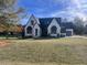 Modern two-story home exterior with manicured lawn at 43 Laurel Knoll Dr, Pittsboro, NC 27312