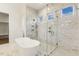 Large walk-in shower with marble tile and glass enclosure at 43 Laurel Knoll Dr, Pittsboro, NC 27312