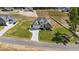 Aerial view of a two-story house with driveway and landscaping at 125 Cotton Fields Ln # 26, Fuquay Varina, NC 27526