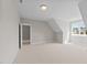 Bright and airy bedroom with neutral carpeting and ample natural light at 125 Cotton Fields Ln # 26, Fuquay Varina, NC 27526