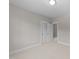 Simple bedroom with carpeted floor and neutral walls at 125 Cotton Fields Ln # 26, Fuquay Varina, NC 27526