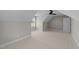 Bright bedroom with sloped ceilings, ceiling fan, and a window at 125 Cotton Fields Ln # 26, Fuquay Varina, NC 27526