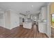 Eat-in kitchen with white cabinets, granite countertops, and stainless steel appliances at 125 Cotton Fields Ln # 26, Fuquay Varina, NC 27526