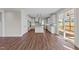 Modern kitchen with white cabinets, granite island, and access to a deck at 125 Cotton Fields Ln # 26, Fuquay Varina, NC 27526