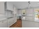 Modern kitchen with granite countertops and stainless steel appliances at 125 Cotton Fields Ln # 26, Fuquay Varina, NC 27526