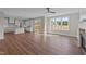 Open floor plan boasts a spacious kitchen island and Gathering room with fireplace and access to a patio at 125 Cotton Fields Ln # 26, Fuquay Varina, NC 27526