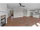 Open concept living room with views into the kitchen and foyer at 125 Cotton Fields Ln # 26, Fuquay Varina, NC 27526