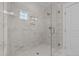 Large shower with marble tile and glass enclosure at 125 Cotton Fields Ln # 26, Fuquay Varina, NC 27526